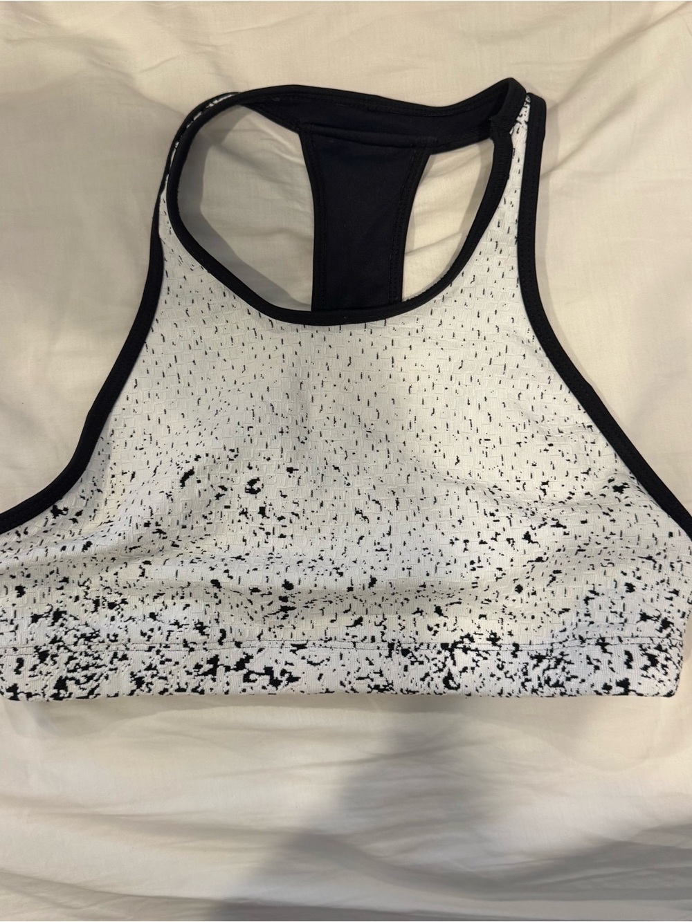 Koral White Sports Bra with Black Speckled Print